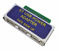 Adaptateur de source