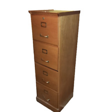 Wooden filing cabinet.