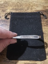 Swarovski Clear Twist Rhodium Plated Solid Hinged Bangle Bracelet