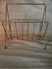 porte journaux et livre Vintage annee 1960 en metal dorée