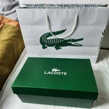 Boite vide Lacoste 32x21.30x13 avec son sac shopping 45x35x12