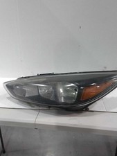 Used Left Headlight Assembly fits: 2016 Ford Focus halogen black headlamp bezel