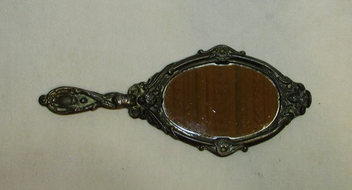 Miroir face main avec - face,