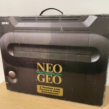Console SNK NEO GEO AES et manette en boîte testée d'occasion