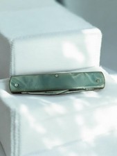 Ancien couteau suisse vintage de poche, multifonction, collection ou usage quoti