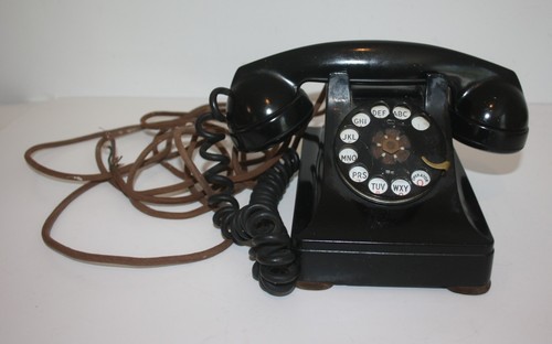 Vintage black bakelite rotary - black,