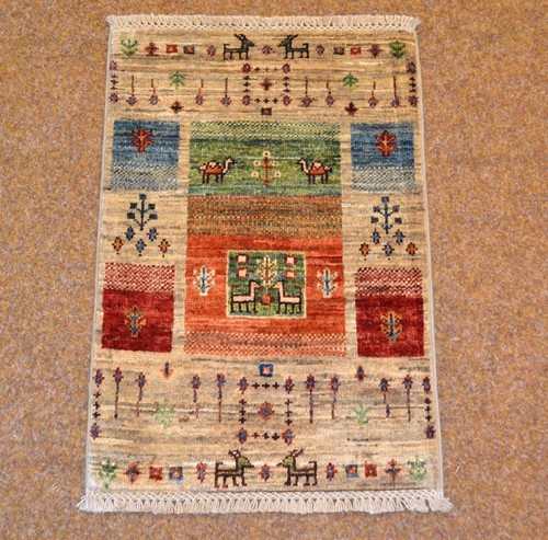 Tapis oriental fait main - fait,