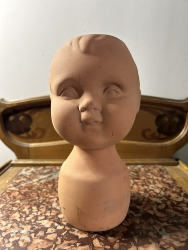 Terre cuite tête enfant - terre,