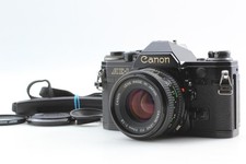 [NEUF] Appareil photo reflex argentique 35 mm Canon AE-1 boîtier noir...