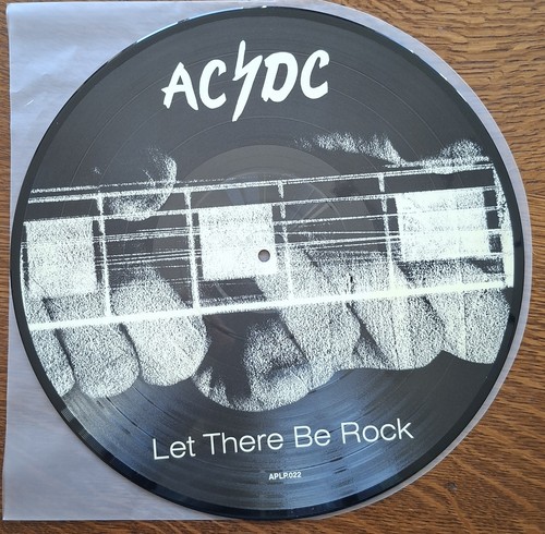 Let there be rock - -,