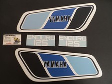 125 DTMX 1977 EMBLEMES/STICKERS RESERVOIR ET CACHES LATERAUX FILM PAUSE SANS EAU