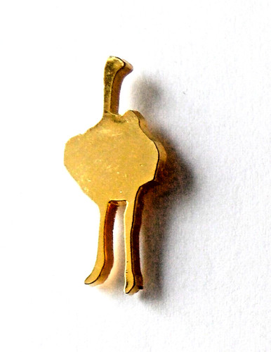 Pin doré autruche - pin's,