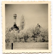 Snowy landscape snow trees pylon - old photo year. 1940