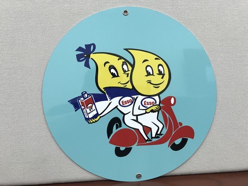 Esso scooter oil garage man - oil,