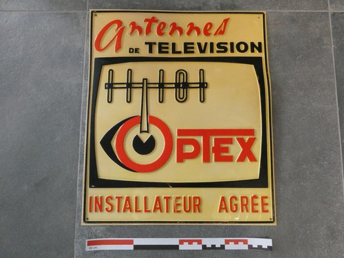 Plaque publicitaire ancienne