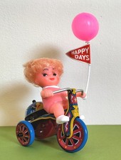 tricycle avec poupée jouet