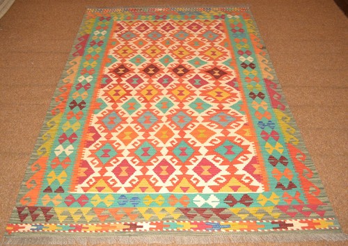 Tapis kilim oriental - tissé, À