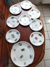 Service De Table Publicitaire (Singer)en  Porcelaine De Limoges décor timbres.