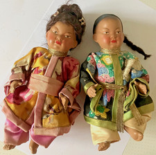 Couple anciennes poupées