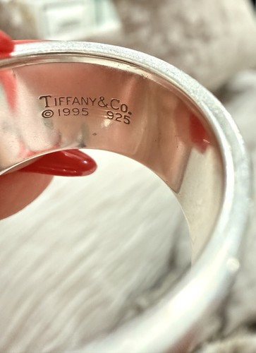 Authentic tiffany co - co, atlas