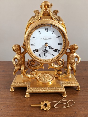 Pendule bronze doré - pendule, en