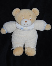 Peluche AJENA Doudou ours beige jaune  bavoir blanc brodé fleur bleu  27 cm TTBE