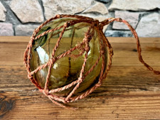 Antique Green Glass Fishing Float with Rope Net - Vintage Marine Decor