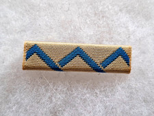 Une barrette de médaille