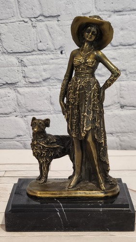 Bronze woman with dog - with,