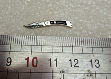 Pin's couteau Puma chasse