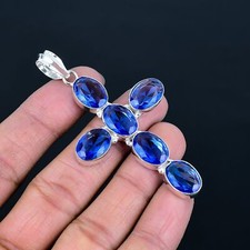 Pendentif croix ovale pierre