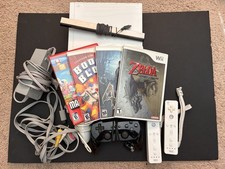 Nintendo Wii + 10 games-  Zelda - Classic Controller - Barely Used - ???