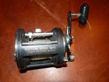 penn gti 320 high speed reel graphite frame level wind works well