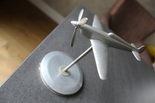 Antique Aluminum Airplane on Base