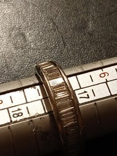 14kt white gold channel set baguettes.