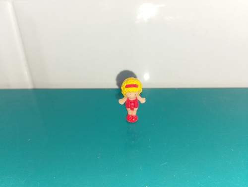 Polly pocket figurine doll