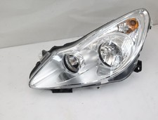 Headlight Opel Corsa D left 13186381 Valeo 05-2009