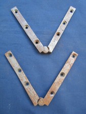 2 pivots charnières table