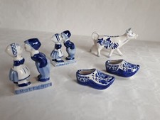 Lot de 4 sujets en faïence de