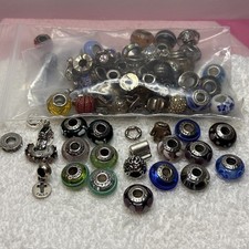 PANDORA AND UNBRANDED ASSORTED MURANO AND STERLING SILVER CHARMS (DAMAGED)
