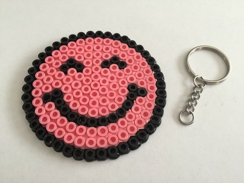 Emoticone smiley sourire rose - smiley,