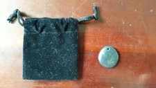 Black Fossil Pendant with Handmade Pouch