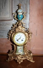 Horloge pendule cartel du XIX ème en bronze et porcelaine style Louis XVI