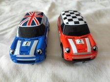 2 voitures scalextric mini cooper