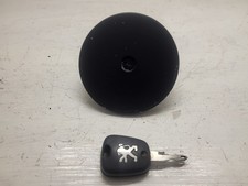 Bouchon réservoir avec une