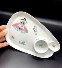 Magnifique assiette coquetier en porcelaine Limoges Baby singer France Lison 