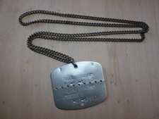 Plaque d' identité d'un soldat français du nord pendant la guerre d' Algérie AFN