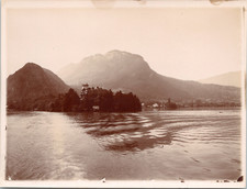 France, mountain, wood and the tower of the Château de Duingt by the shores of the lake d&#039;Ann
