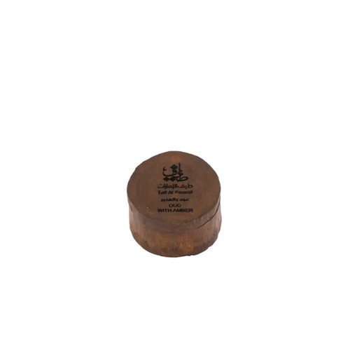 Oud with amber taif al - oud,