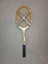 Raquette de tennis vintage Donnay avec sa presse Zephyr.